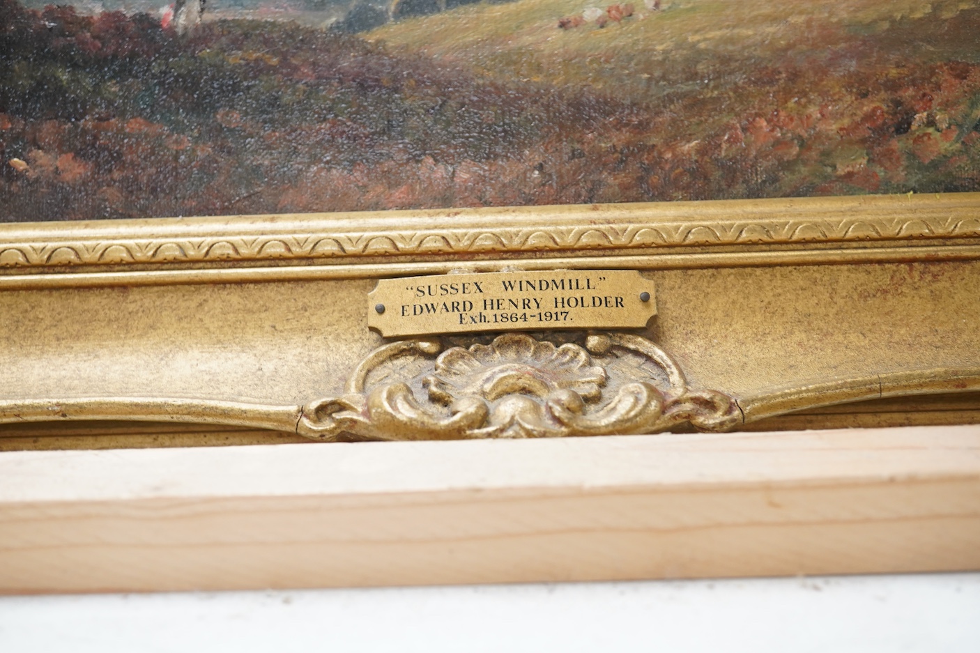 Edward Henry Holder (exh. 1864-1917), oil on canvas board, ‘Sussex windmill’, unsigned, 25 x 34cm, applied plaque to the ornate gilt frame